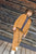 Child wearing a brown corduroy outfit 