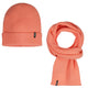 Coral beanie and scarf set on a white background
