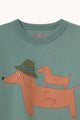 Two Dogs Graphic Baby Tee Base Dark Green