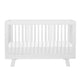 A  3-in-1 convertible crib with toddler bed conversion kit in white
